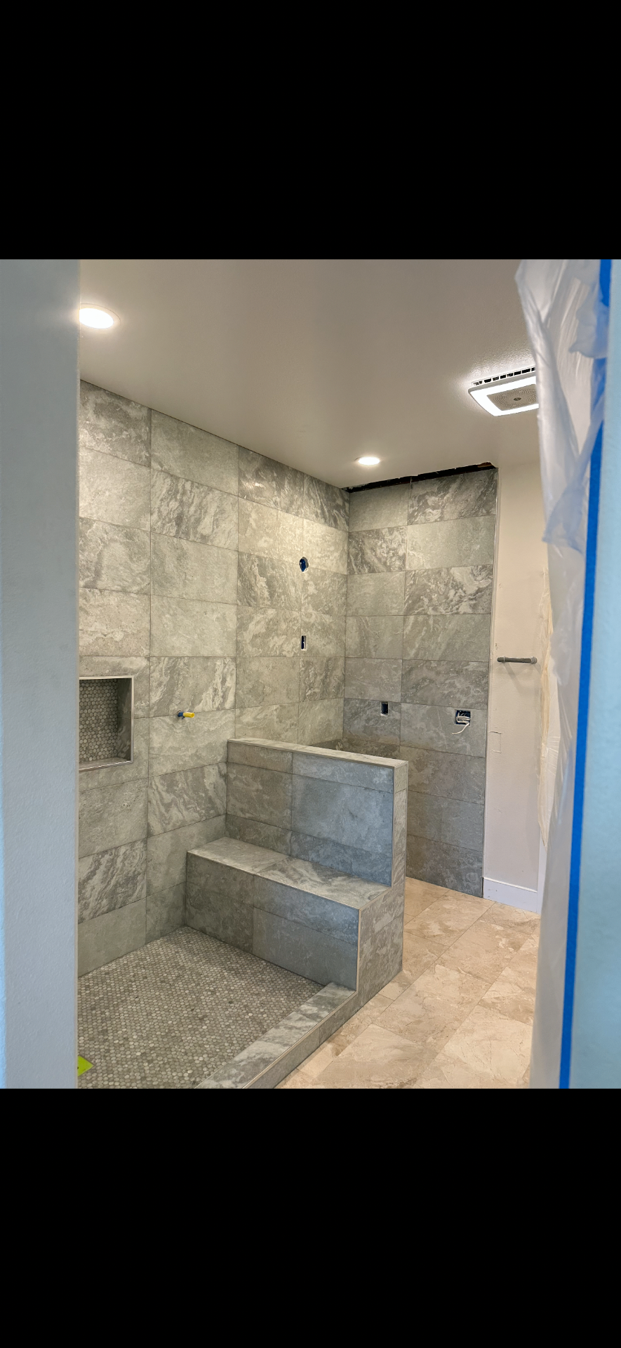 Custom tile shower with built-in bench